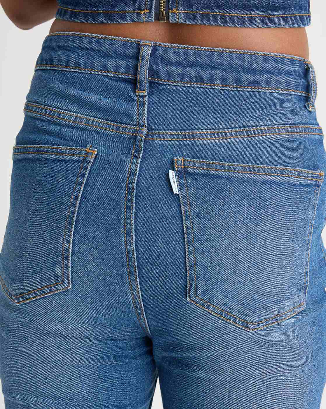 Women Lightly Washed Distressed Bootcut Jeans
