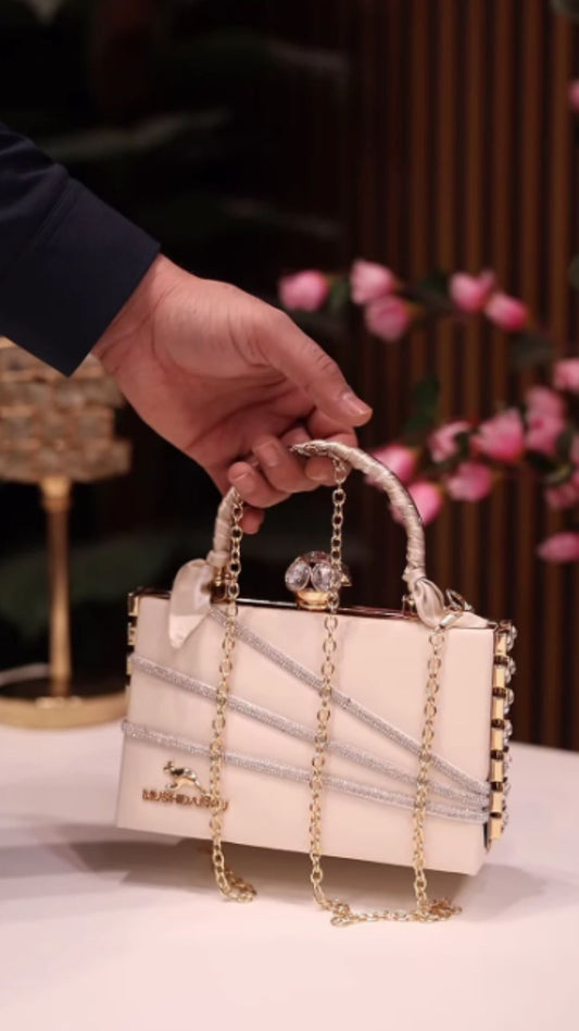 Celeste Charm – Ivory Luxe Clutch